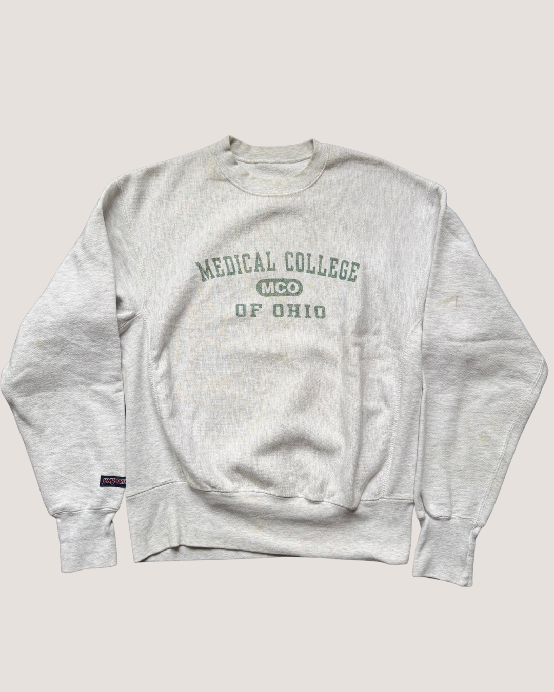 Gray sweatshirt with 'Medical College of Ohio' text on a light gray background