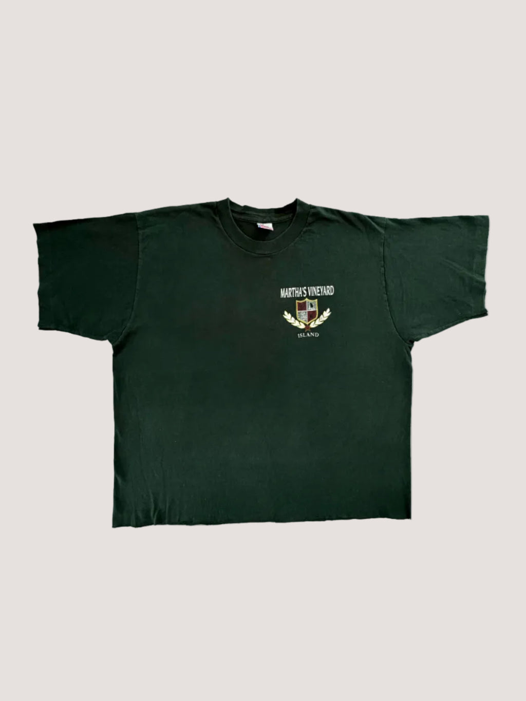 Dark green t-shirt with a logo on a light gray background