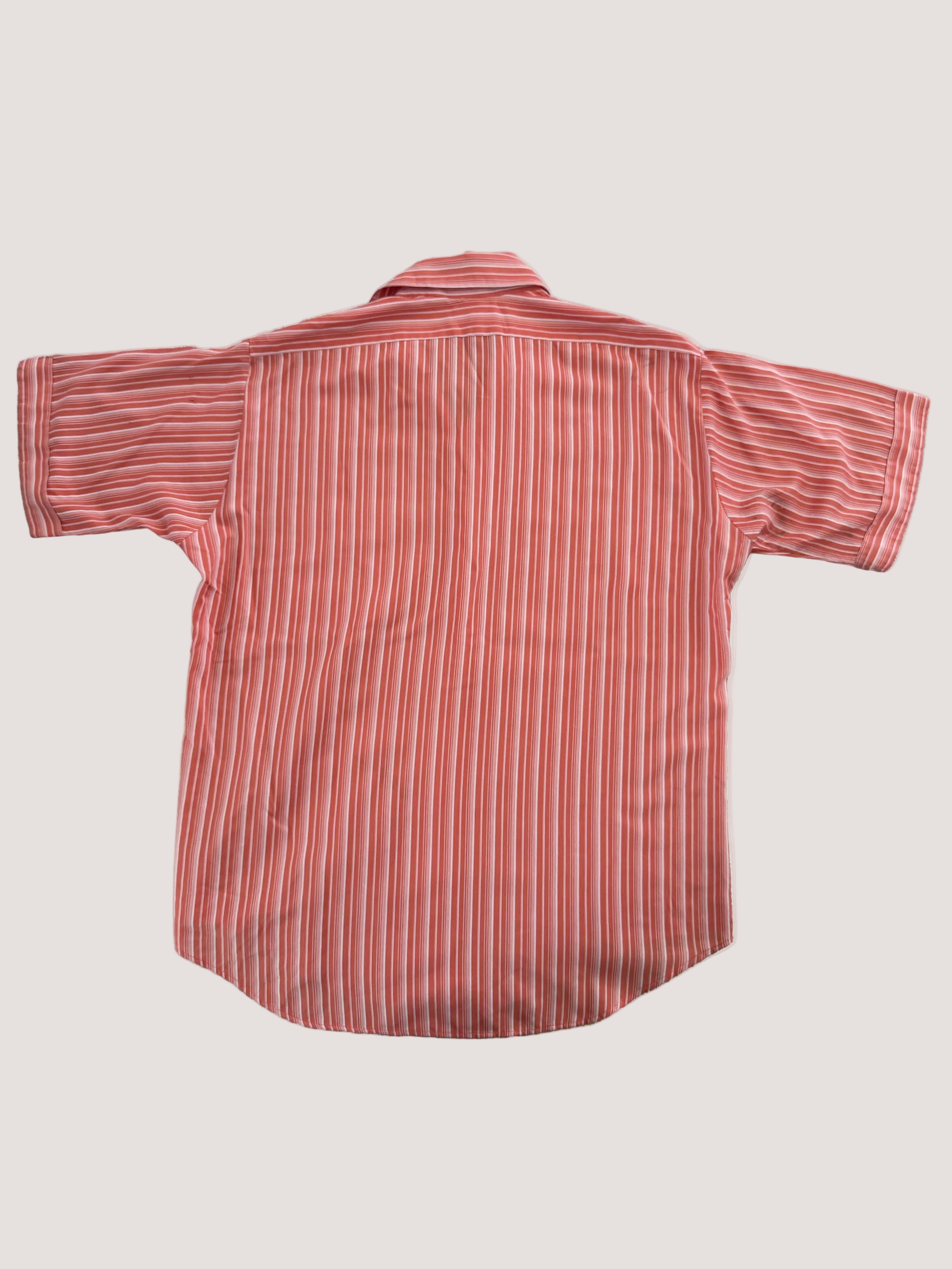 Red and white striped shirt on a light gray background