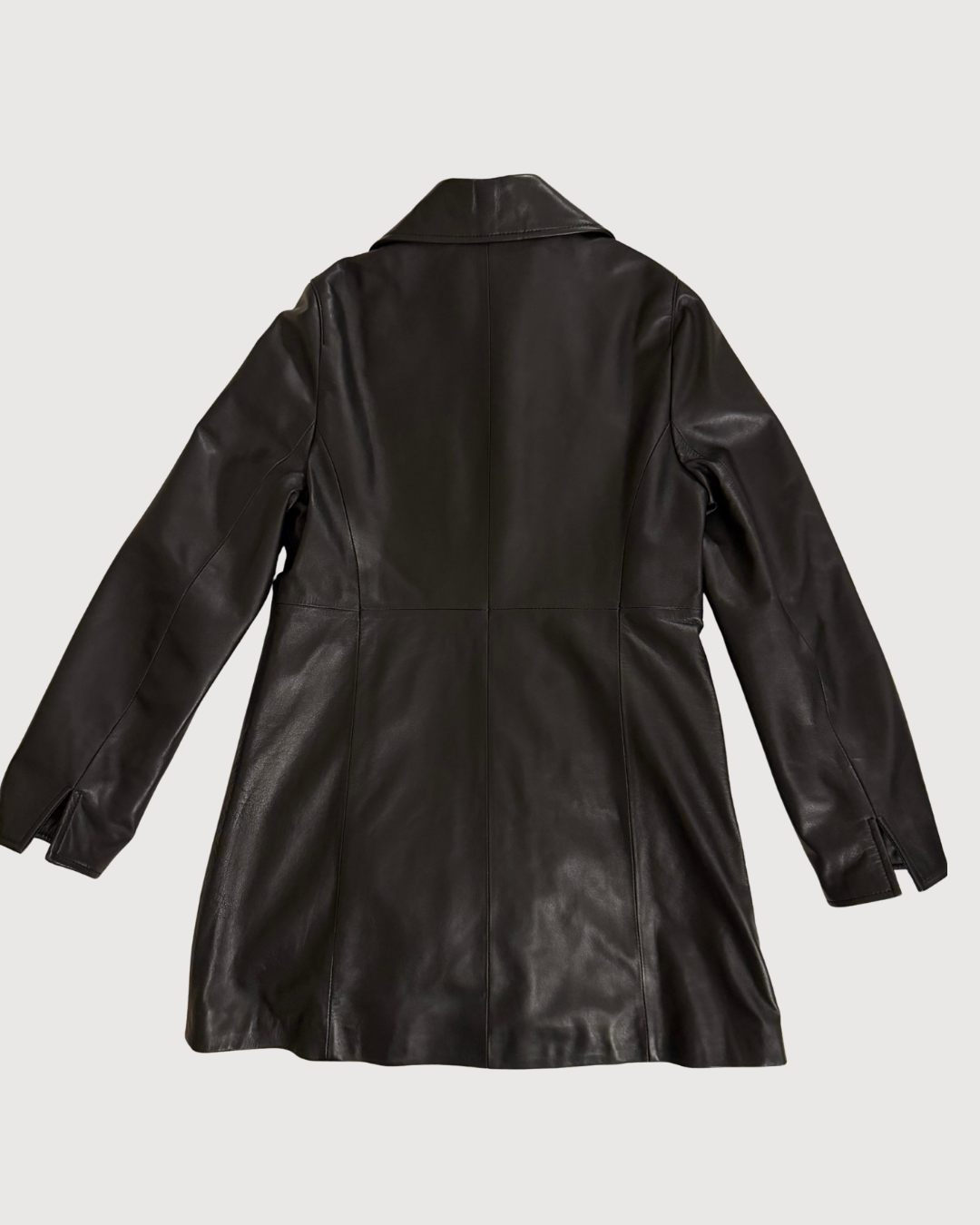Balmain black leather coat on a light gray background