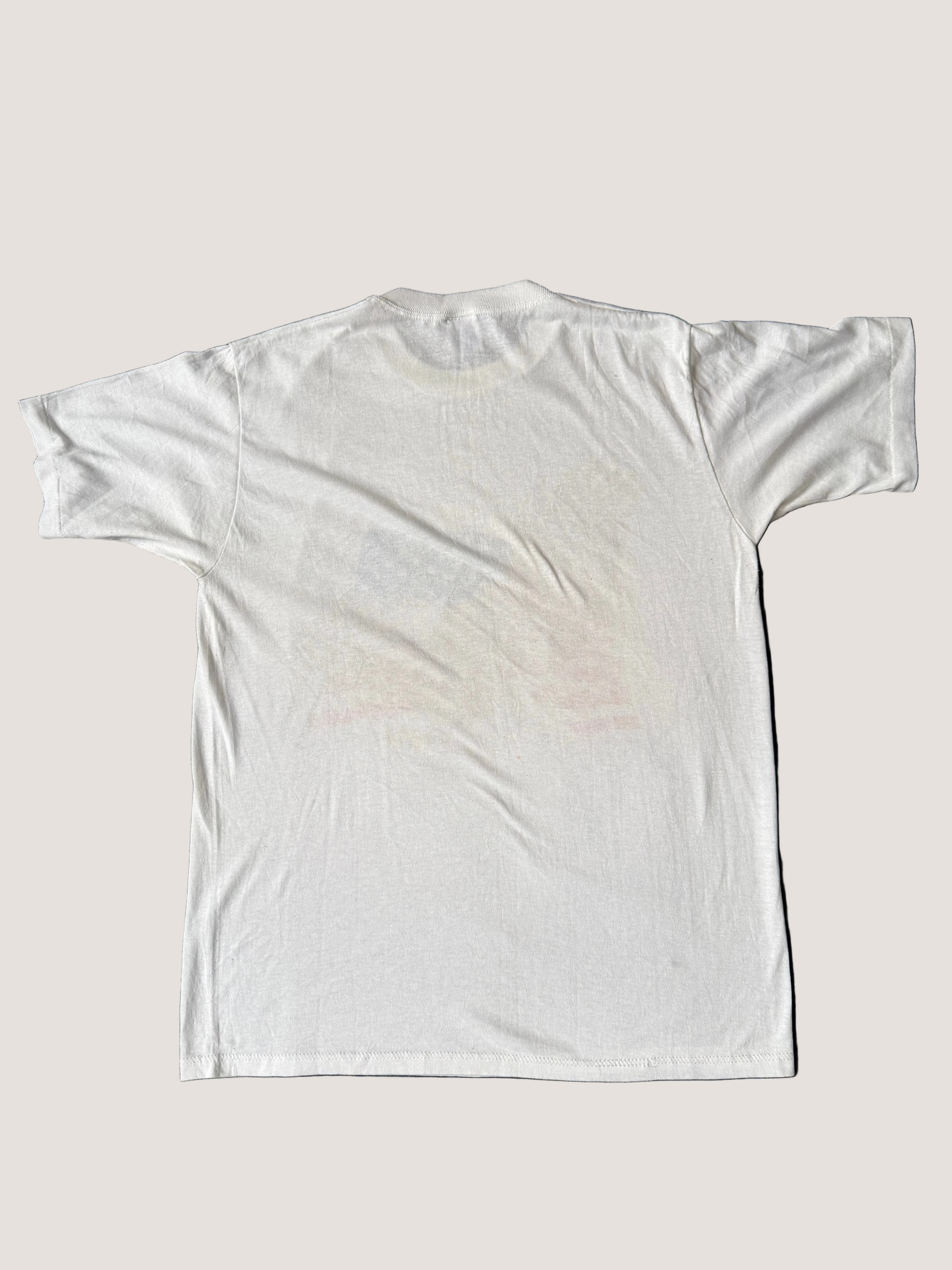 White t-shirt on a grey background