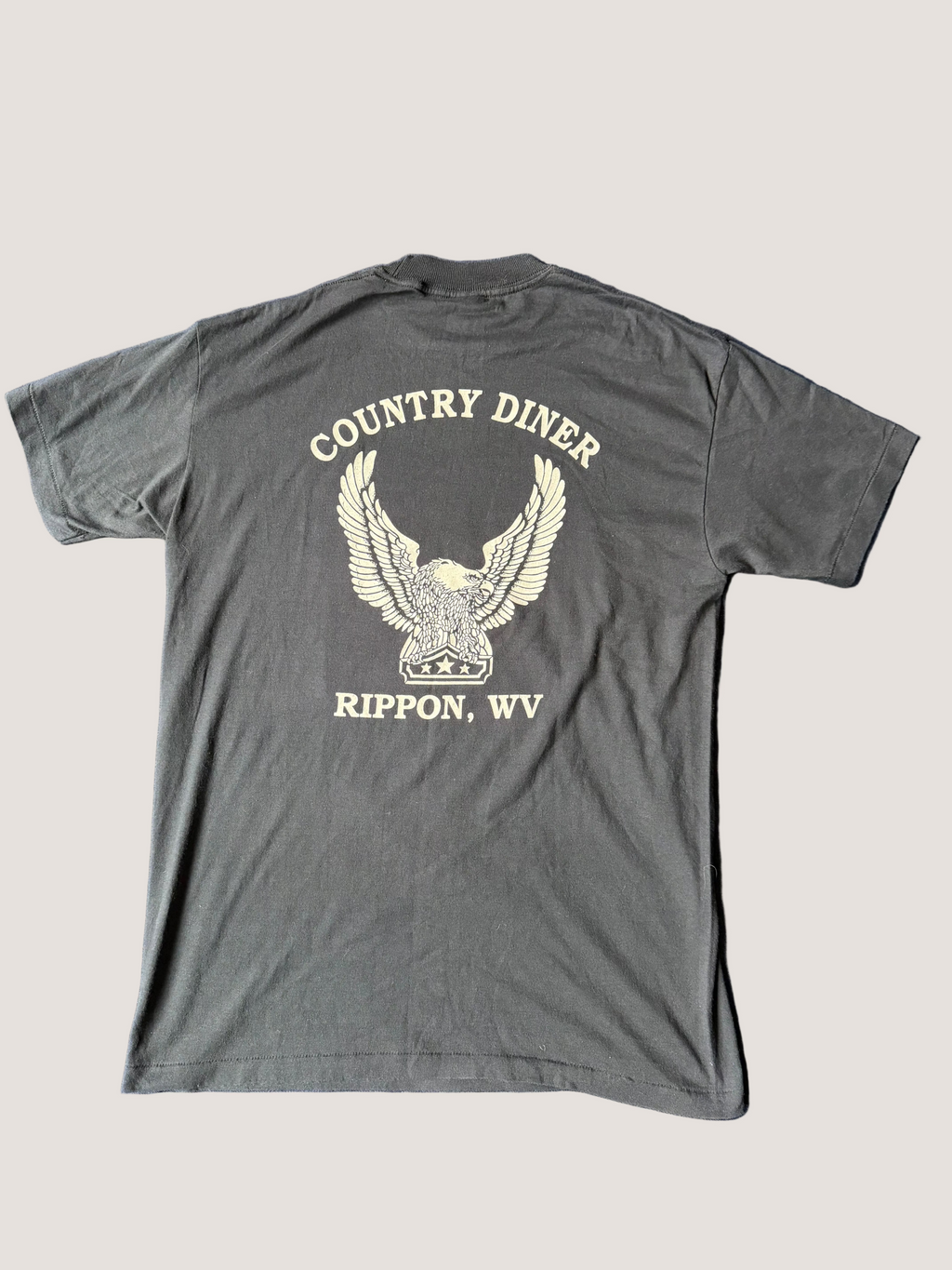 Black t-shirt with 'Country Diner Rippon, WV' design on a grey background