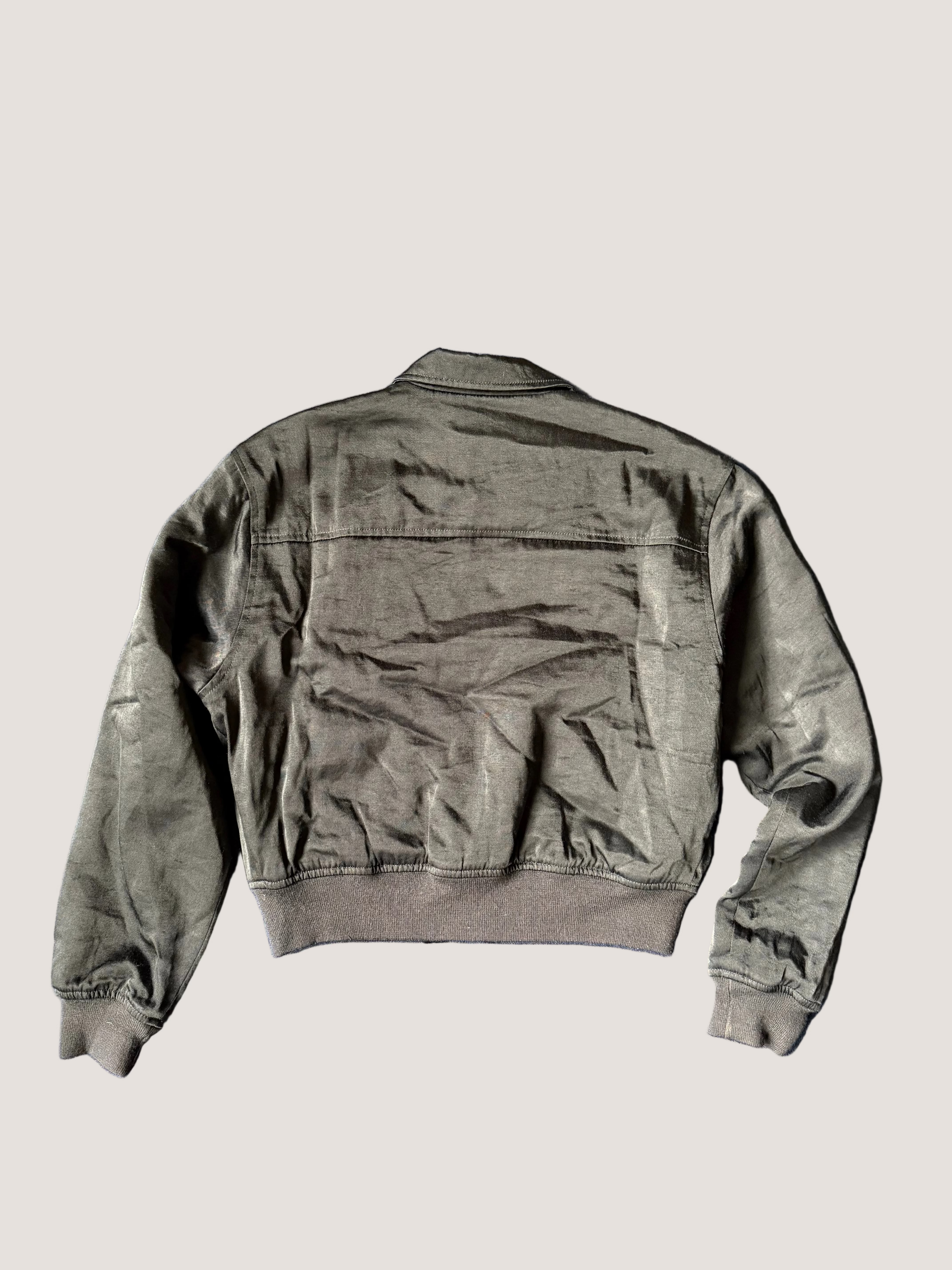 Black jacket on a blue textured background