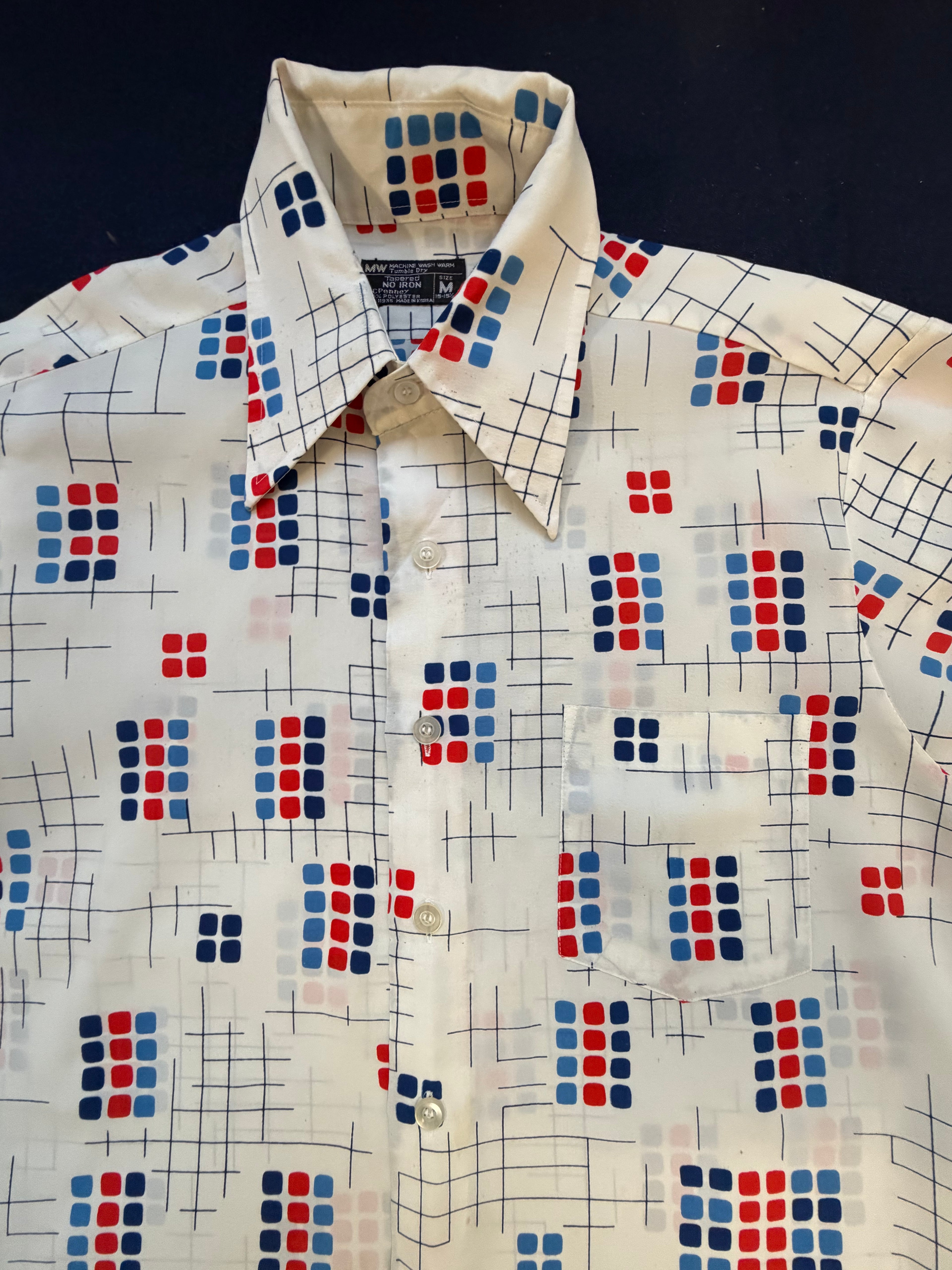 Shirt with a geometric pattern on a dark background