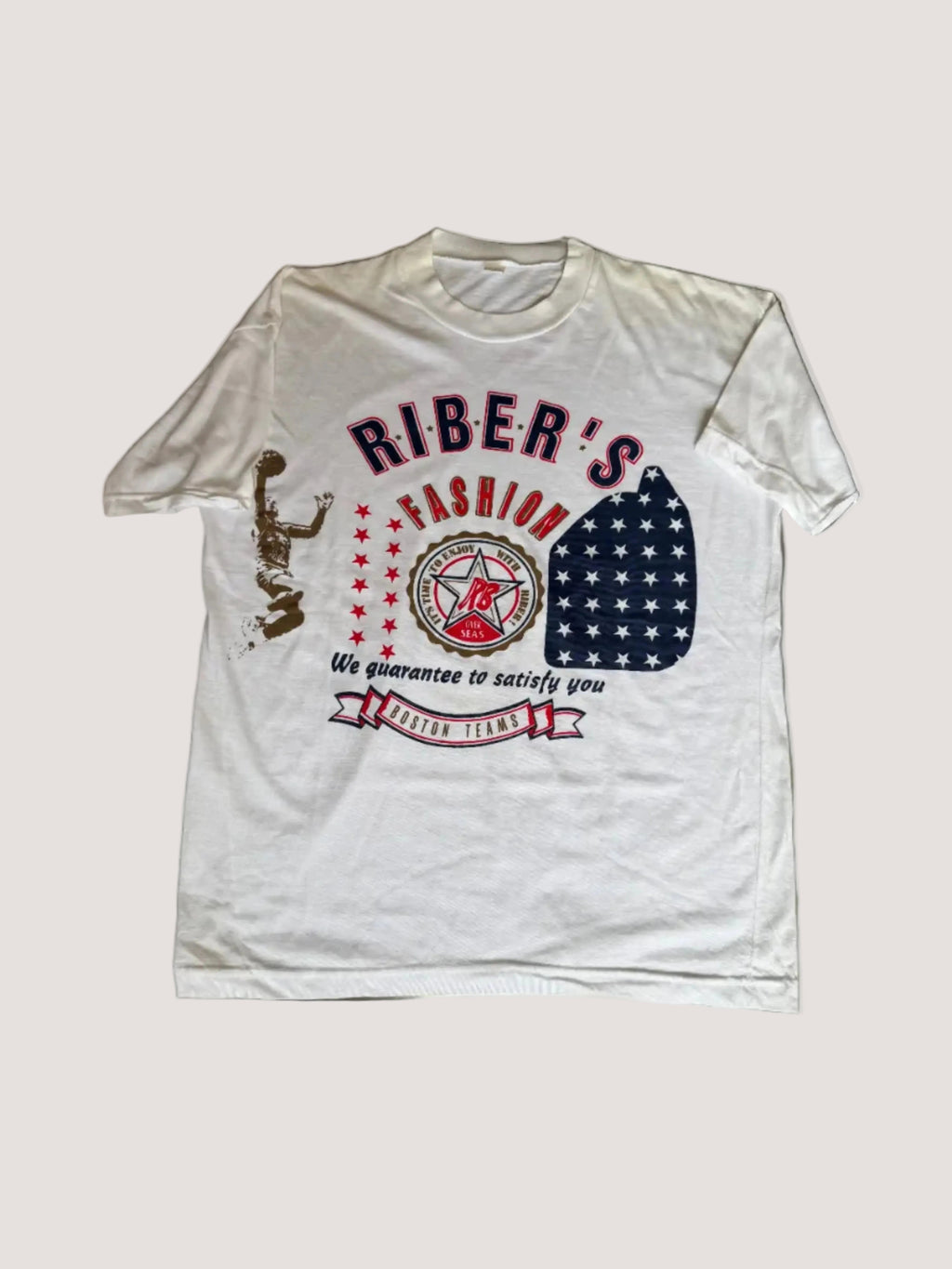 White t-shirt with 'Riber's Fashion' graphic design on a flat surface.