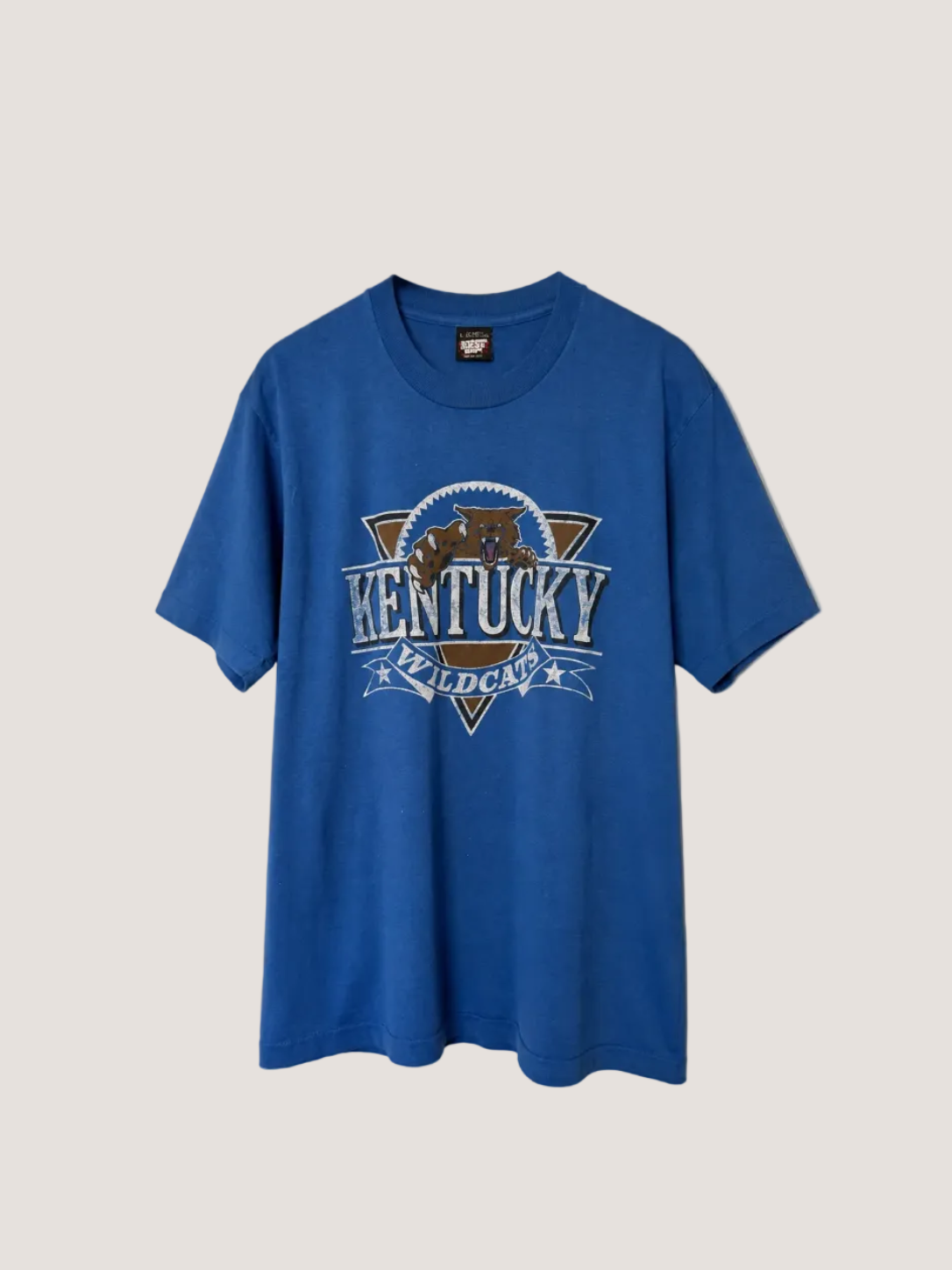 Blue t-shirt with 'Kentucky Wildcats' logo on a beige background