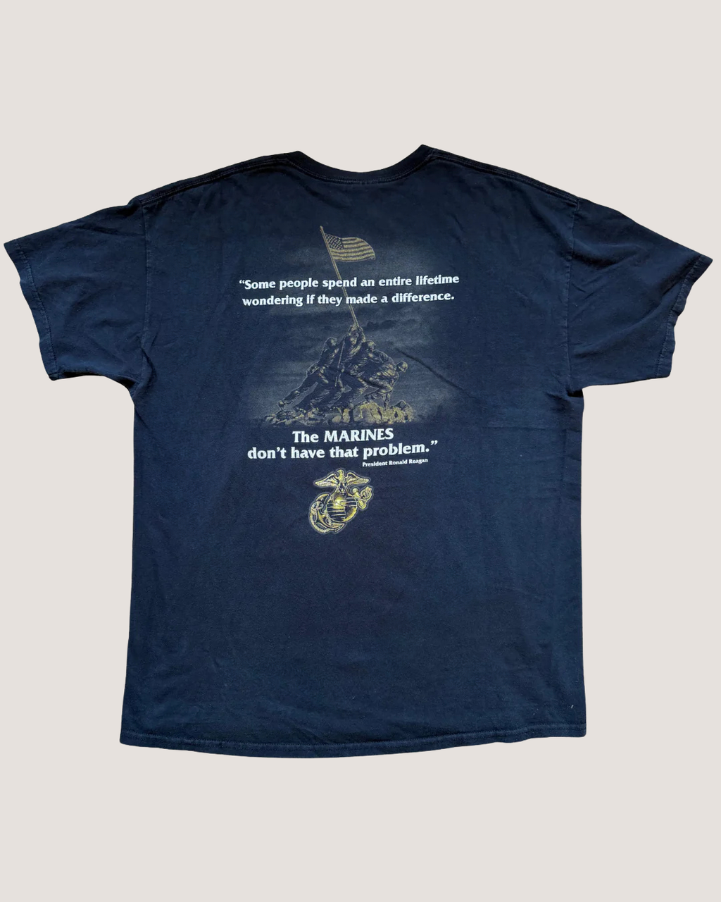 Black Marines t-shirt with text and graphic on a light gray background