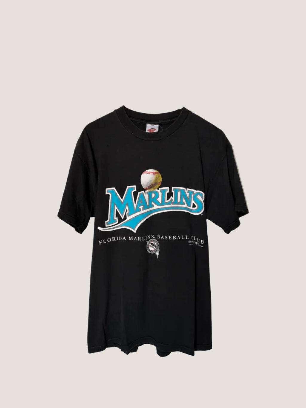 Black t-shirt with Florida Marlins logo on a plain background