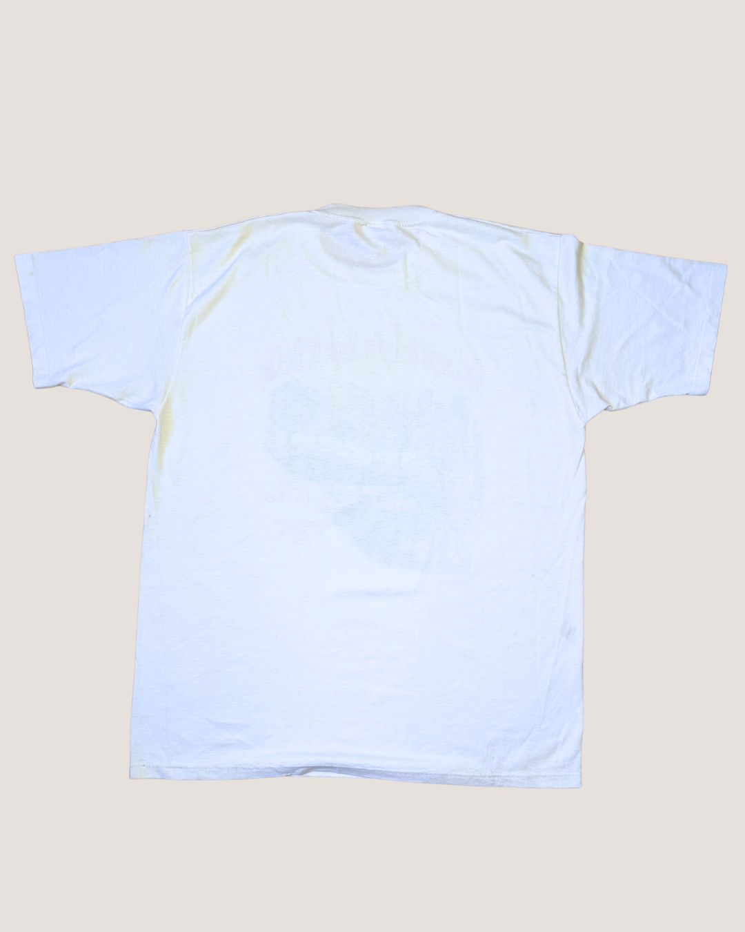 Plain light blue t-shirt on a beige background