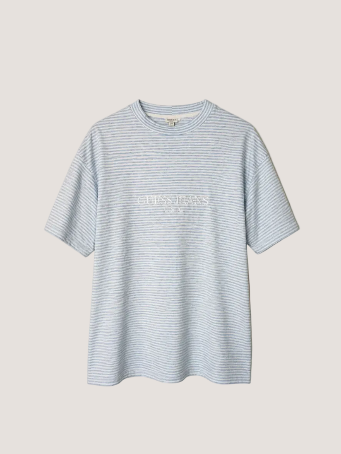 Blue and white striped t-shirt with a brand logo on a beige background