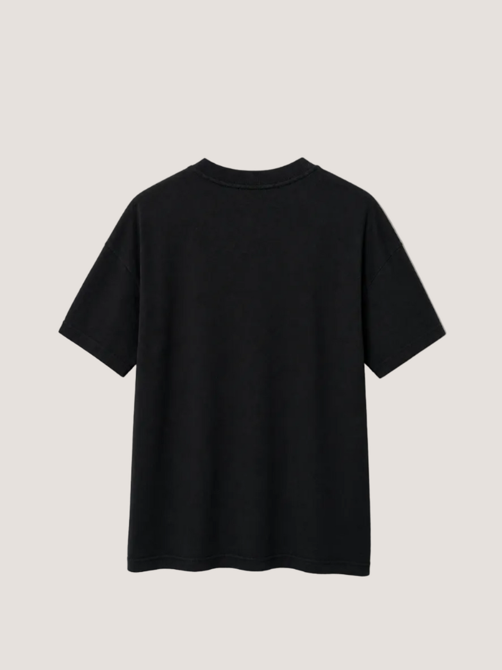 Black t-shirt on a beige wall