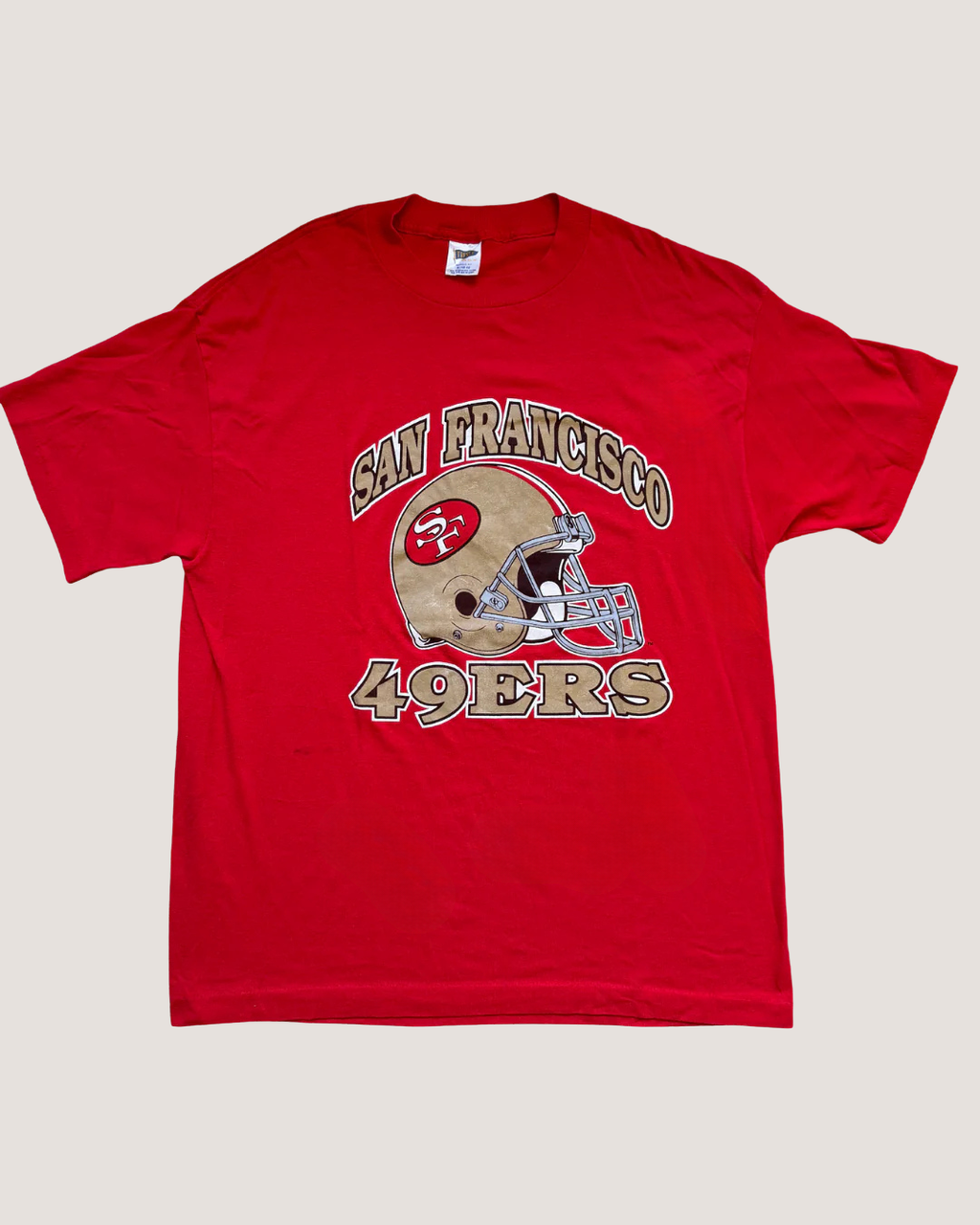 Red t-shirt with San Francisco 49ers logo on a white background