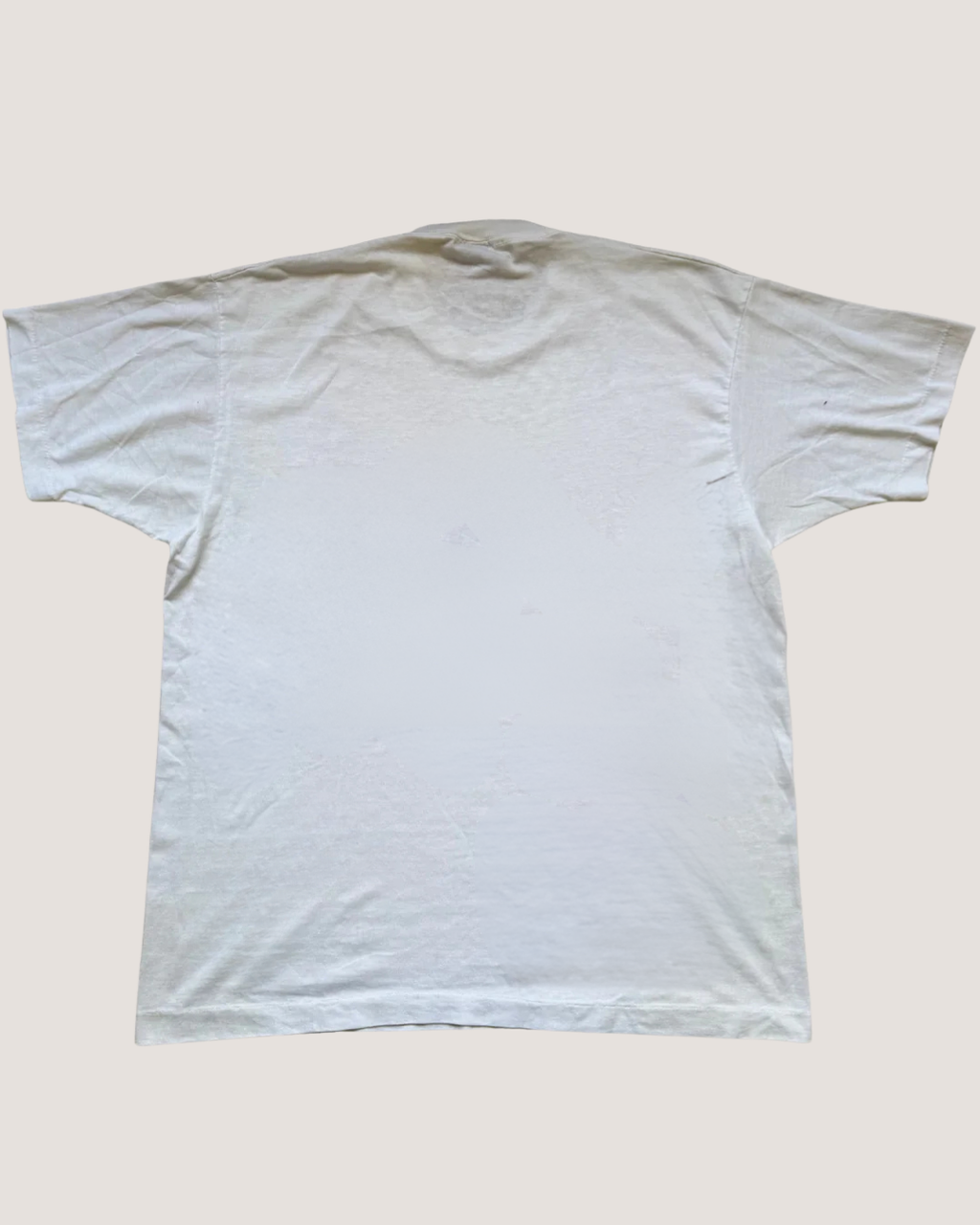 Seal white t-shirt on a light beige background