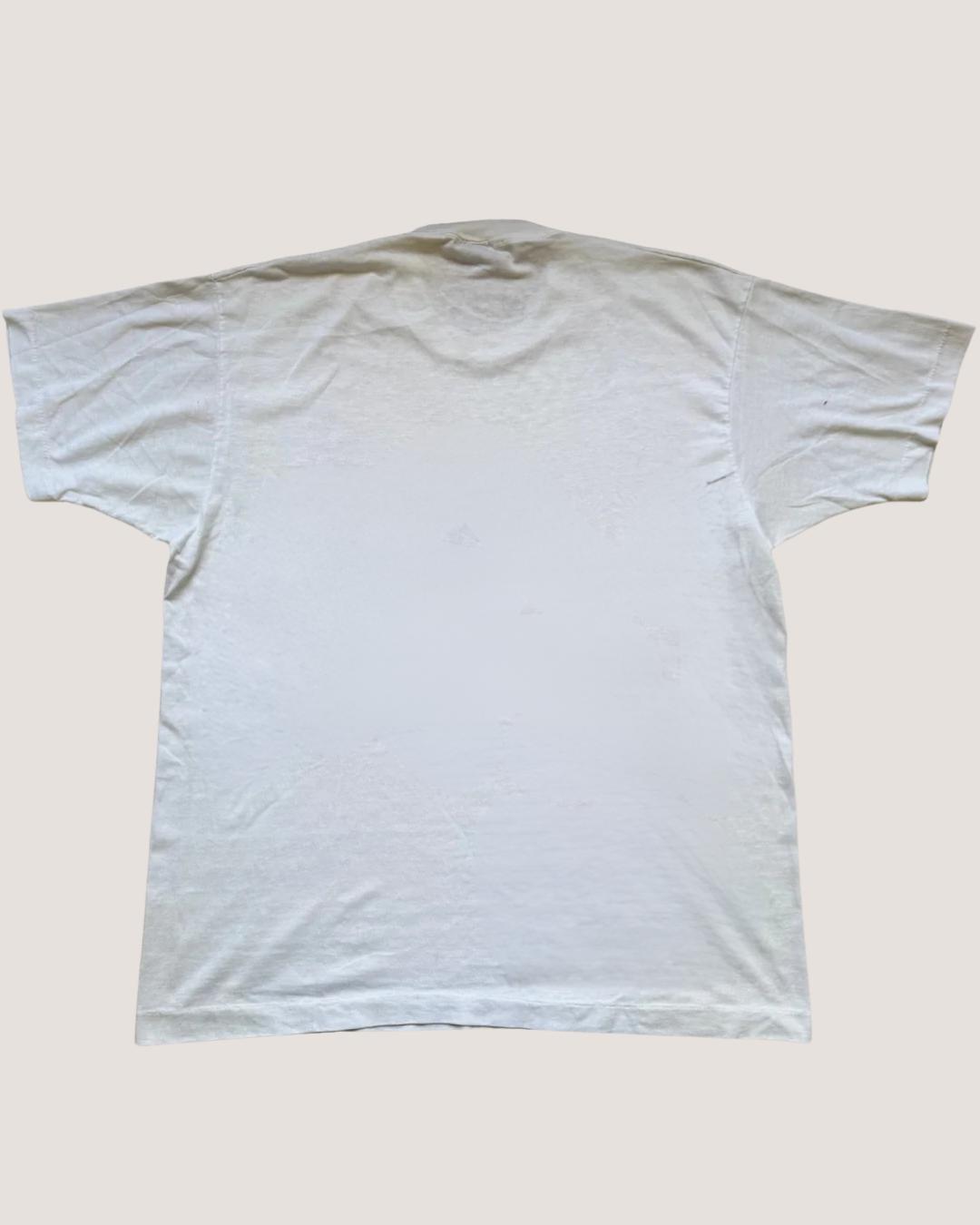 Seal white t-shirt on a light beige background